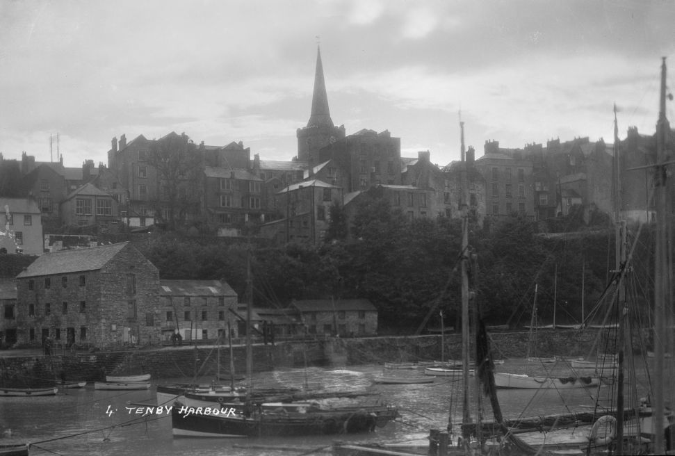 Tenby harbour, postcard. © Crown Copyright RCAHMW.